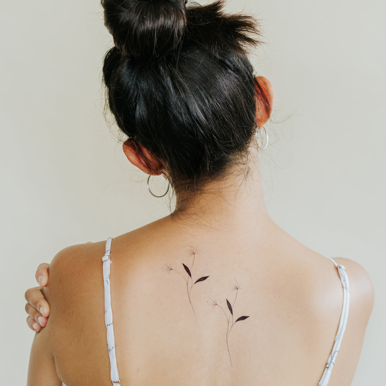 A FLOWER GROWS TATTOO PAIR