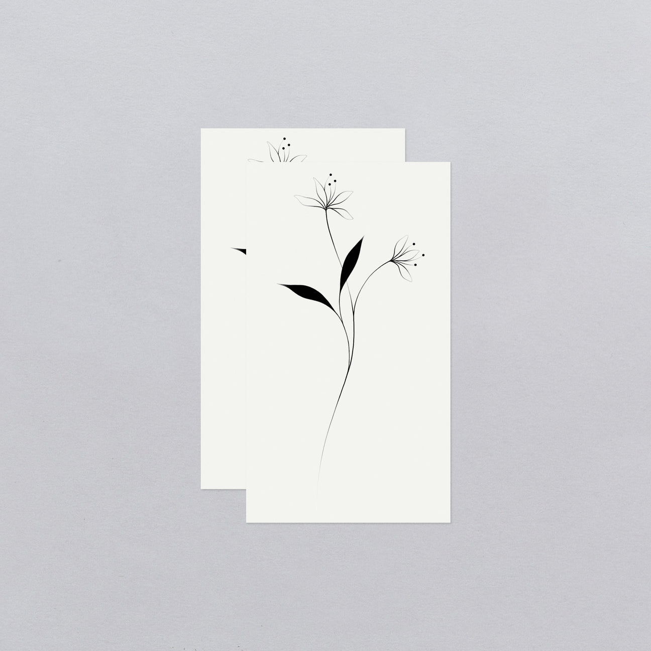 A FLOWER GROWS TATTOO PAIR