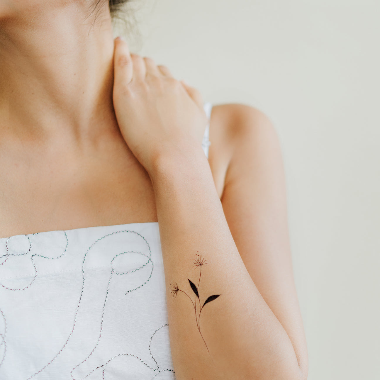 A FLOWER GROWS TATTOO PAIR